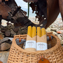 Load image into Gallery viewer, Basket with yellow gloves and a white label on a rocky surface